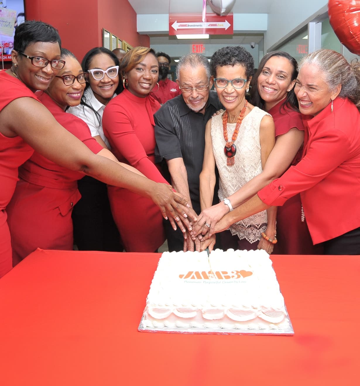 The JMMB team marks a celebration